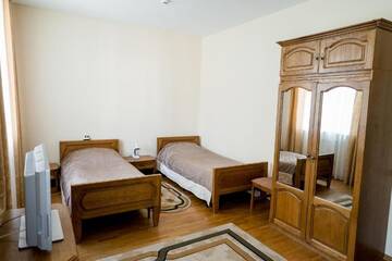 Фото номера Стандартный двухместный номер с 2 отдельными кроватями Отель Гостиничный Комплекс Каменюки г. Каменюки 10